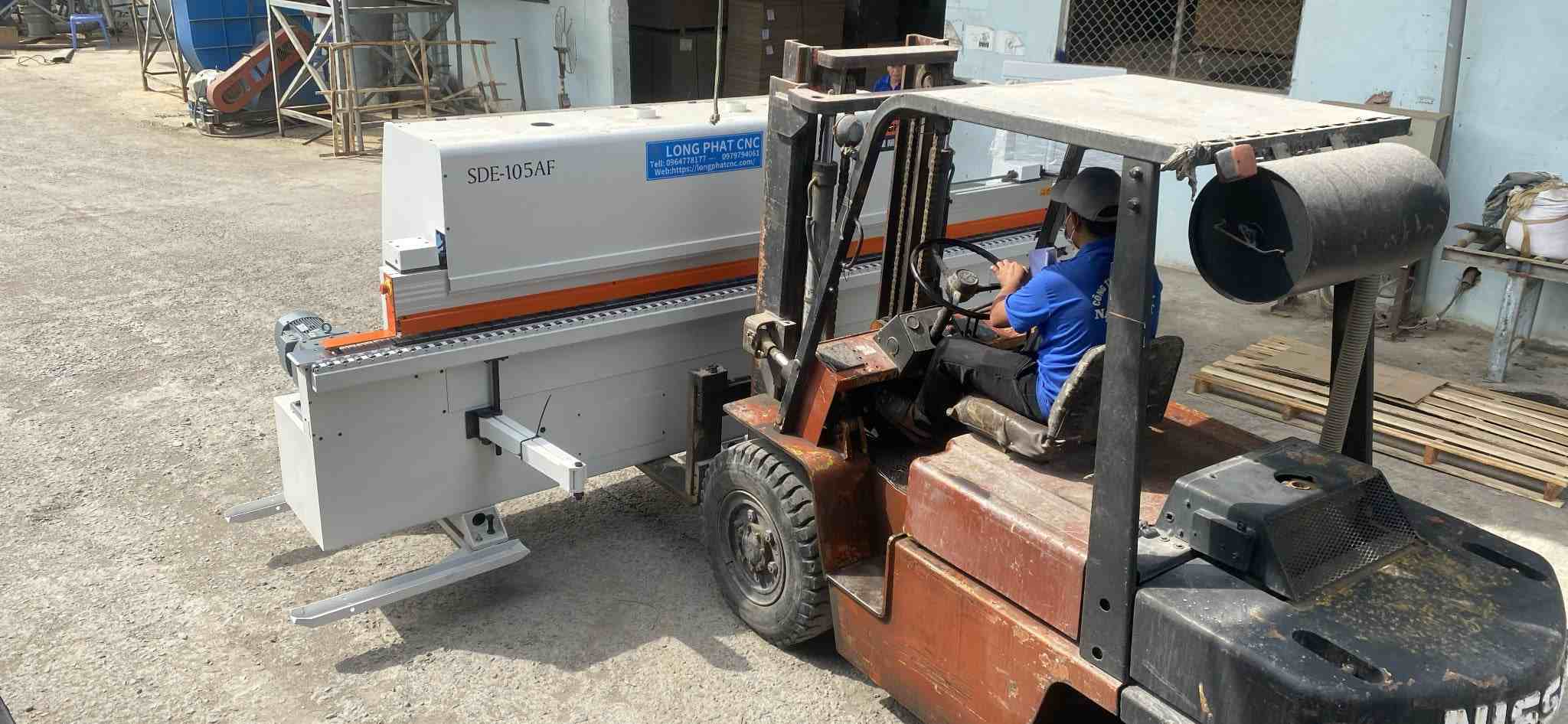 Mua máy dán cạnh