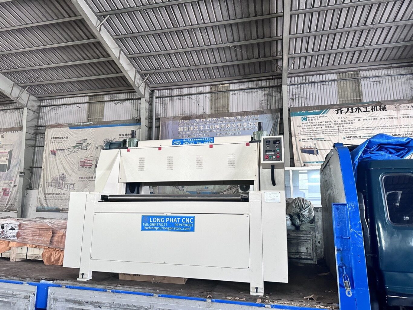 bàn giao máy ép ván